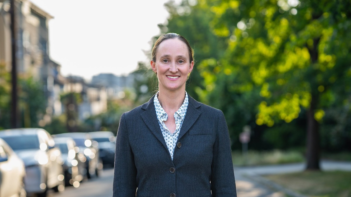 Portrait of Katie Wilson smiling outdoors during her 2025 Seattle mayoral campaign.