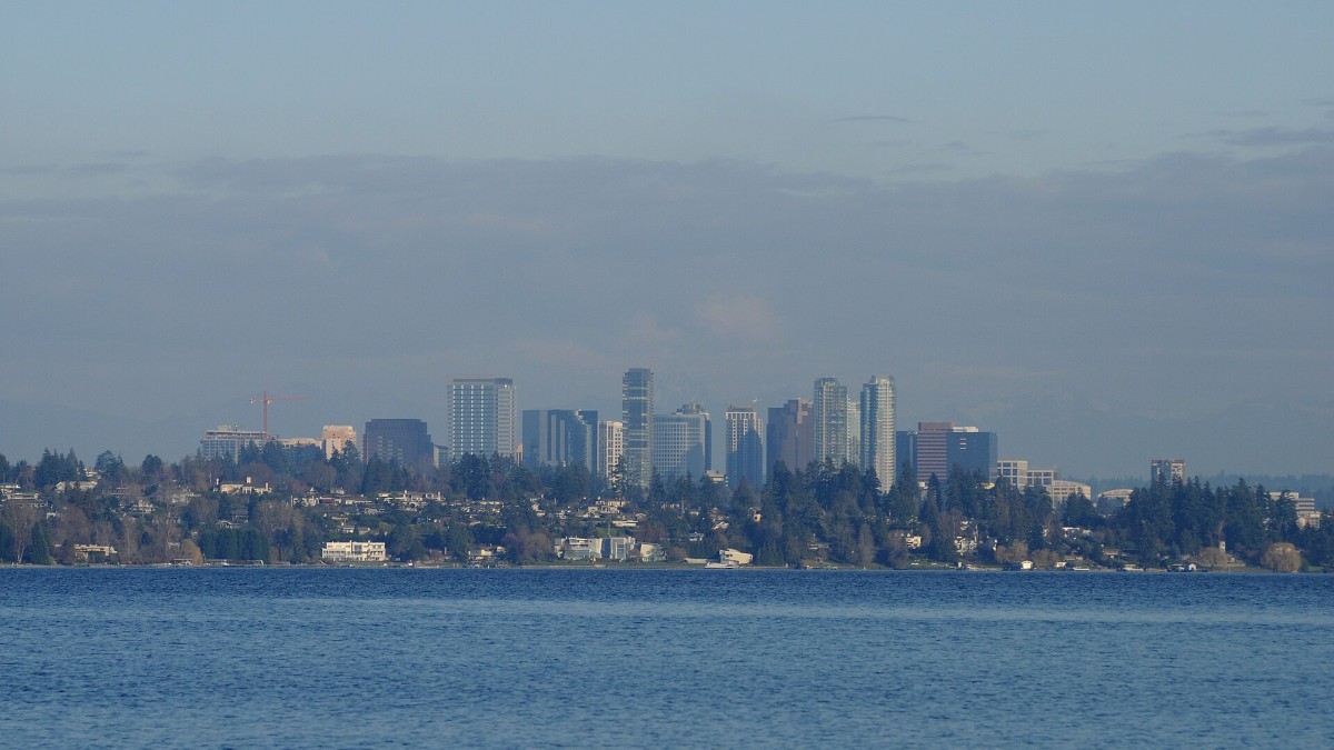The Bellevue, Washington skyline seen across Lake Washington from Seattle's Madrona Park.