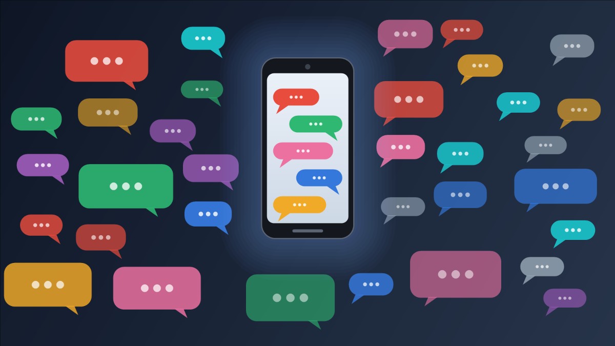 Illustration of a smartphone whose screen shows chat bubbles in many colors, surrounded by dozens more speech bubbles in red, blue, green, purple, amber, teal, pink and gray against a dark background.